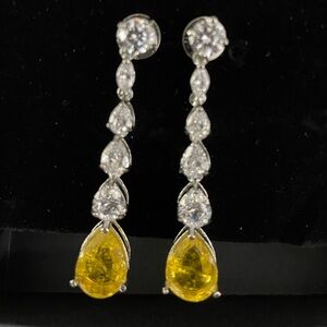 Elegant, stunning white/yellow crystal stone tear drop earrings.